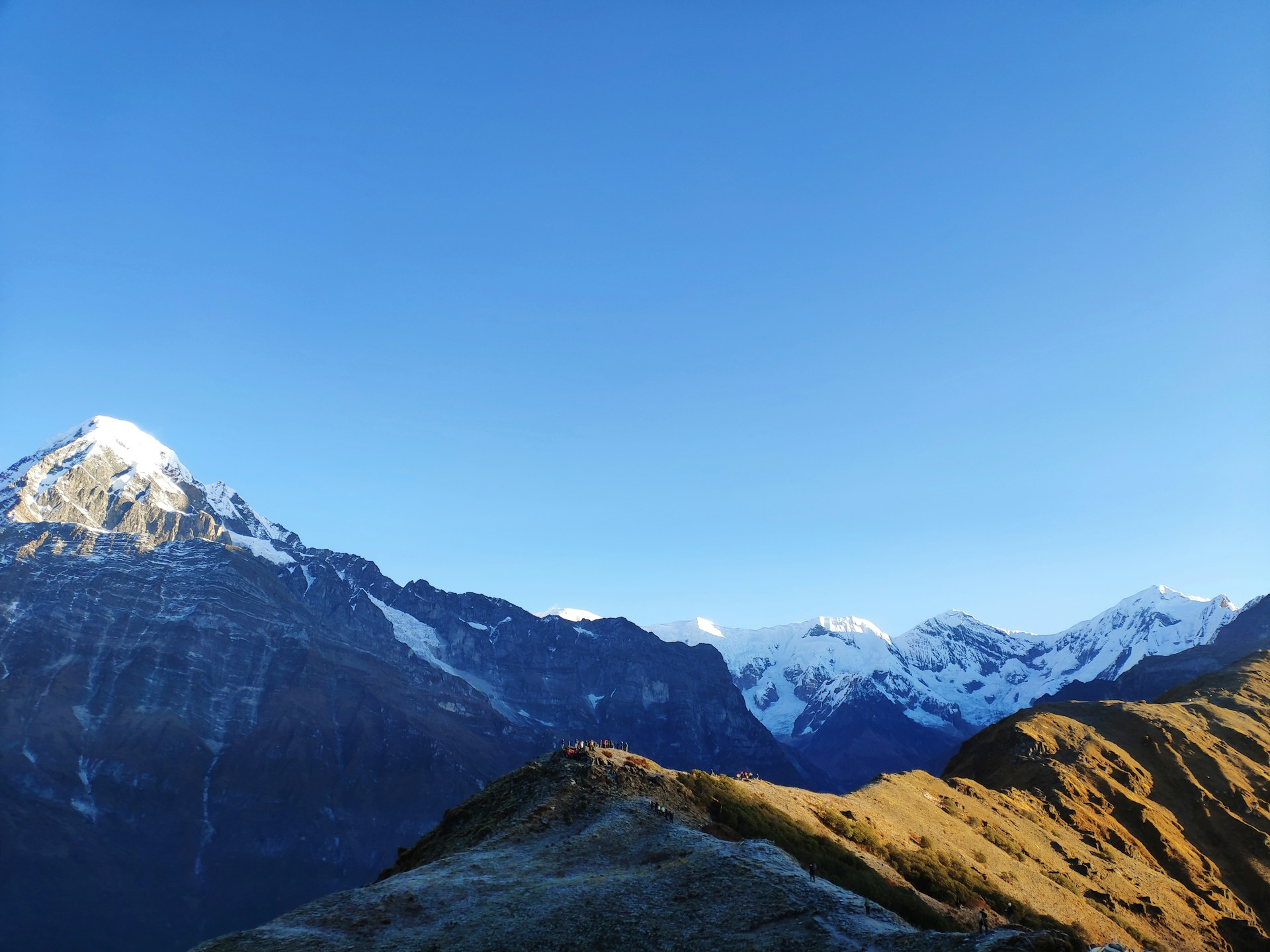 Sunlight on Snowy Peaks